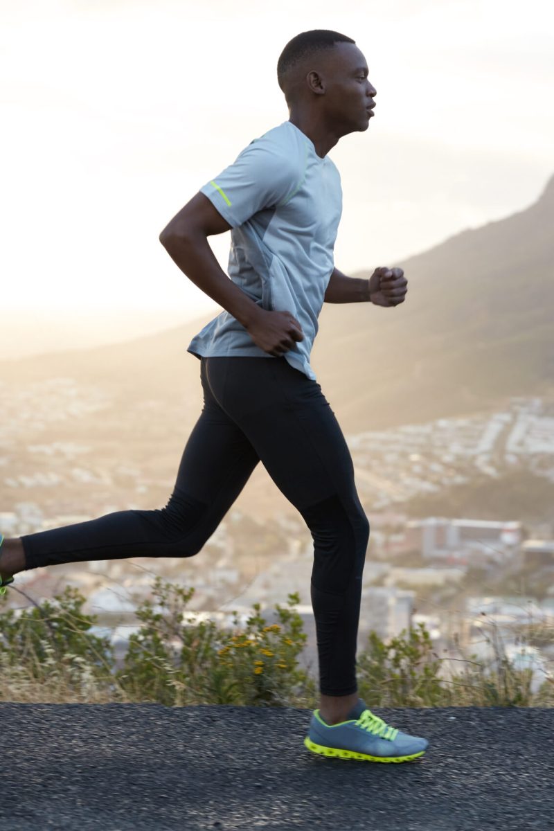 outdoor-shot-active-dark-skinned-man-running-morning-has-regular-trainings-dressed-tracksuit-comfortable-sneakers-concentrated-into-distance-sees-finish-far-away-scaled-1.jpg